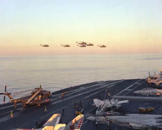 RH-53Ds fly over USS Nimitz April 1980